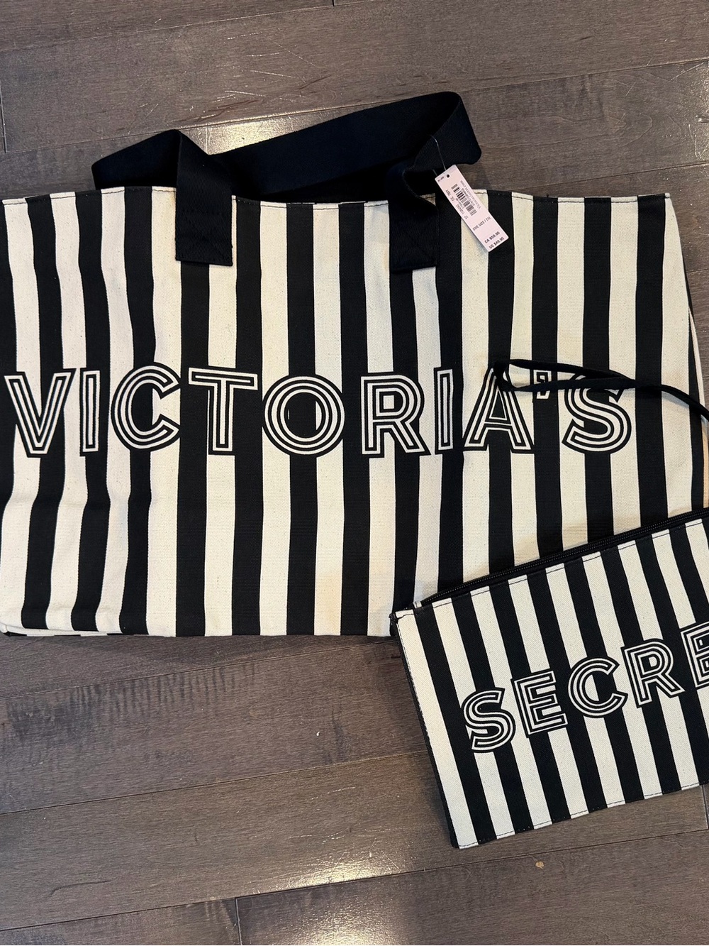 Brand new Victoria's Secret Black and White Striped Tote with Matching Pouch